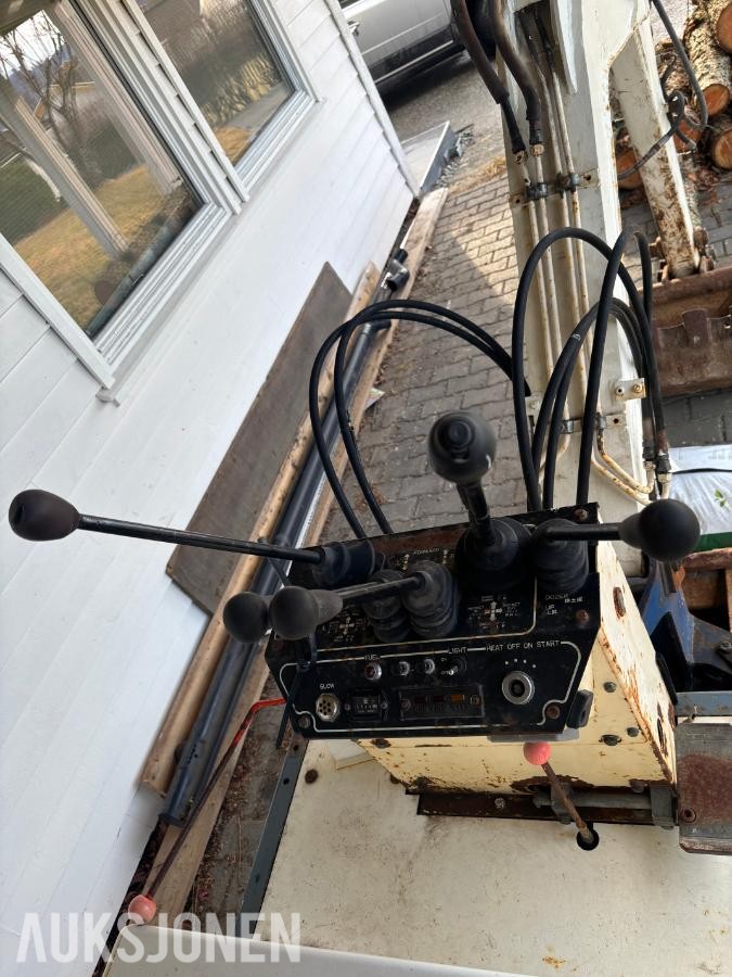 1985 Nissan M106t minigraver - mva fri