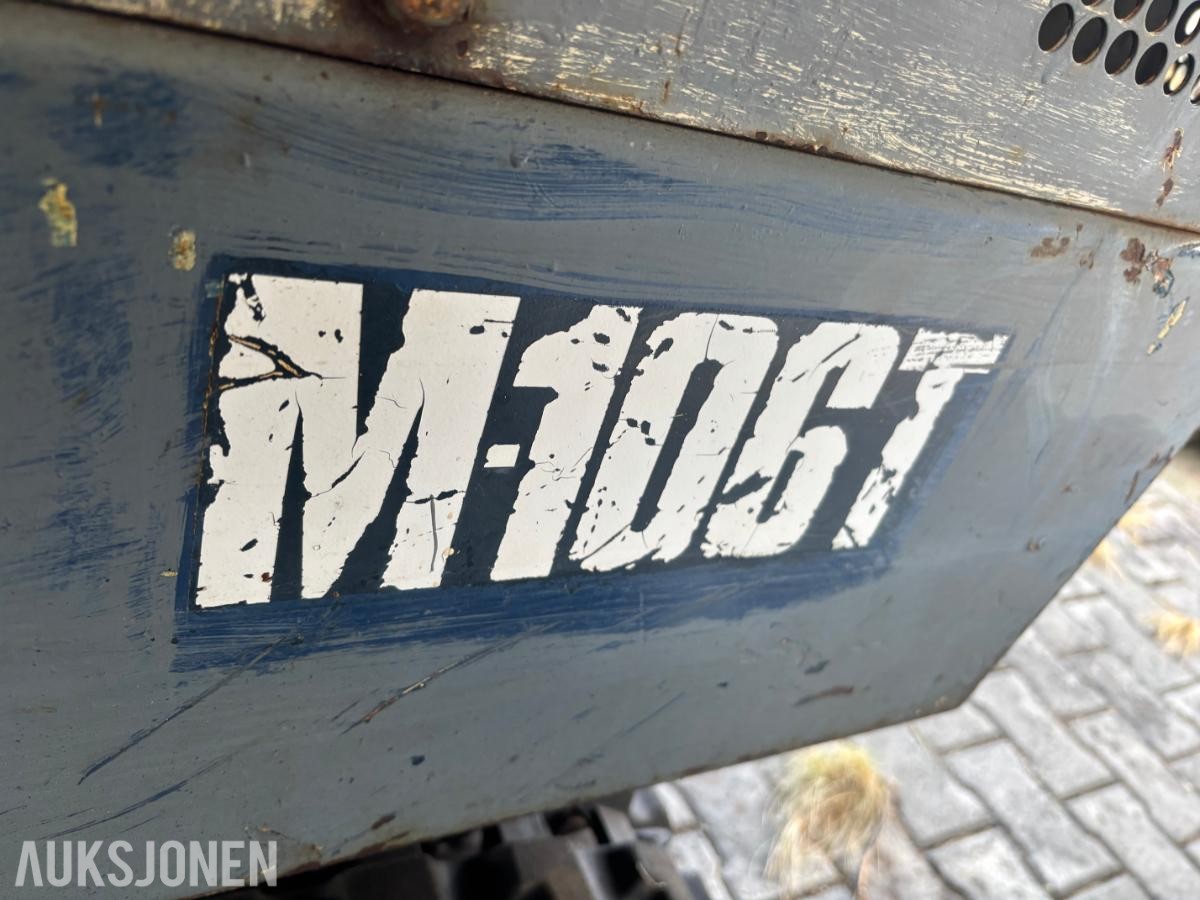 1985 Nissan M106t minigraver - mva fri