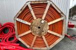 2024 Stor kabeltrommel med oransje fiberrør (FTTx-ducting) fra Ducatel