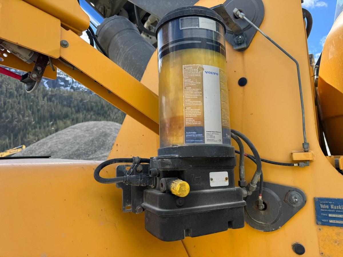 2013 Volvo L180G hjullaster med sentralsmøring, Spakstyring og 3. funksjon
