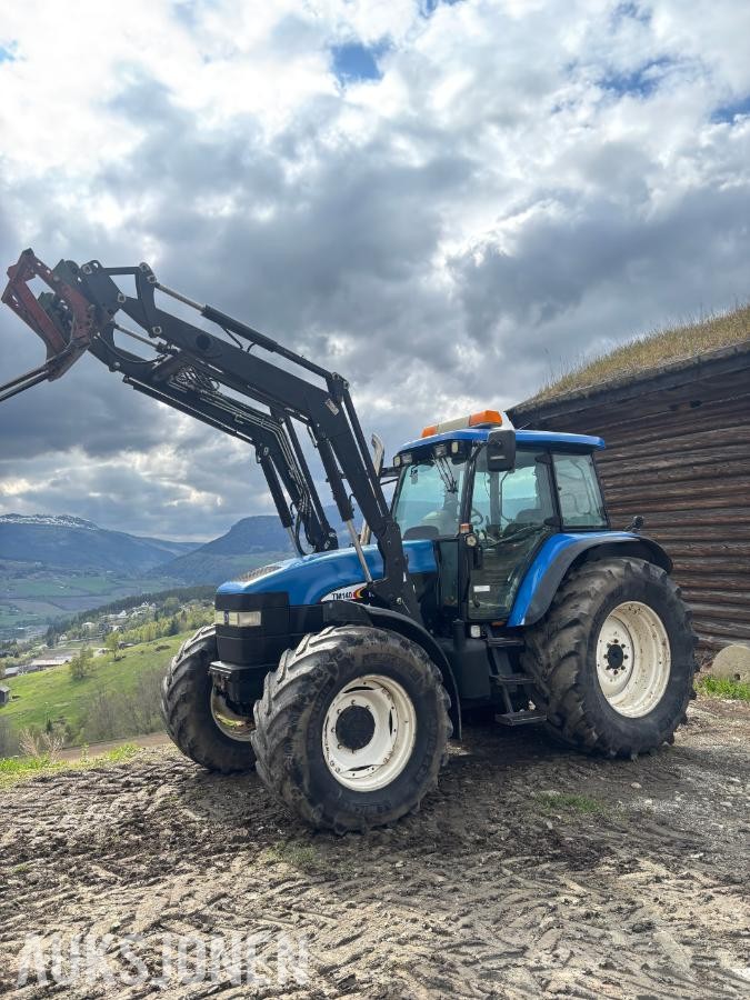 2005 New Holland TD60 traktor med laster