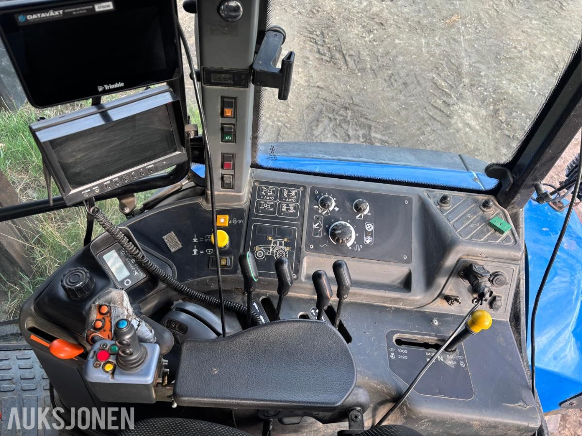 2005 New Holland TD60 traktor med laster