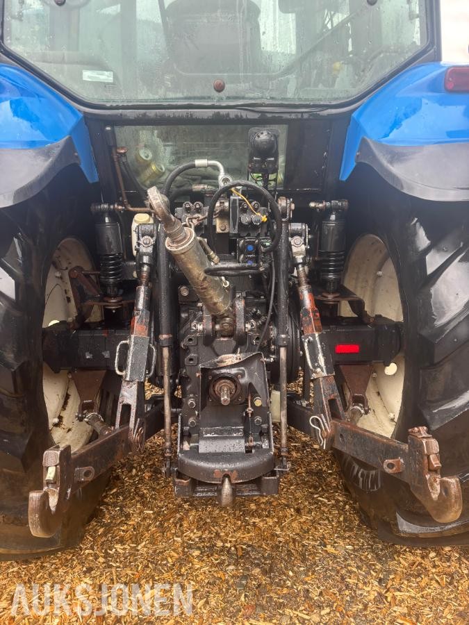 2005 New Holland TD60 traktor med laster