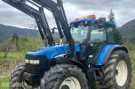 2005 New Holland TD60 traktor med laster