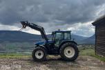 2005 New Holland TD60 traktor med laster