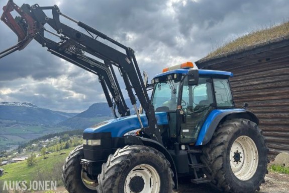 2005 New Holland TD60 traktor med laster