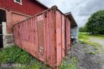 Container med rørdeler og diverse