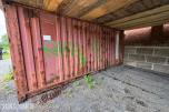 Container med rørdeler og diverse