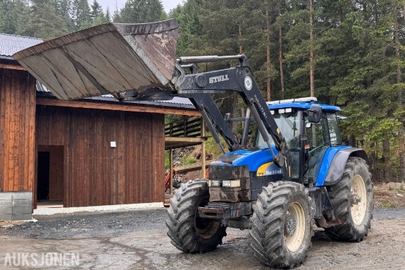 2006 New Holland TM190 med Stoll ProfiLine FZ 60.1 frontlaster (2018 modell) og skuffe - 40 km/t