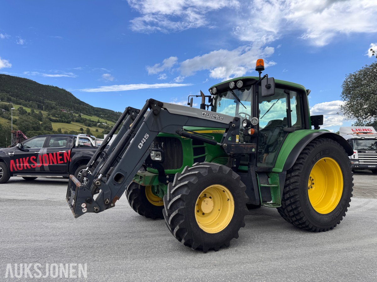 2011 John Deere 6330 Premium med Quicke Q45 laster