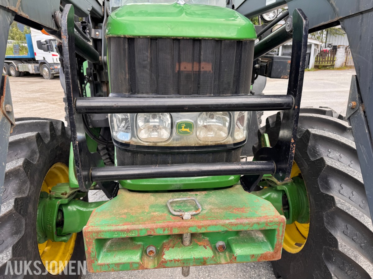 2011 John Deere 6330 Premium med Quicke Q45 laster