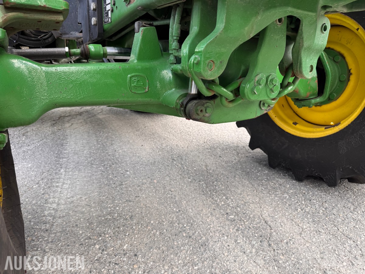 2011 John Deere 6330 Premium med Quicke Q45 laster