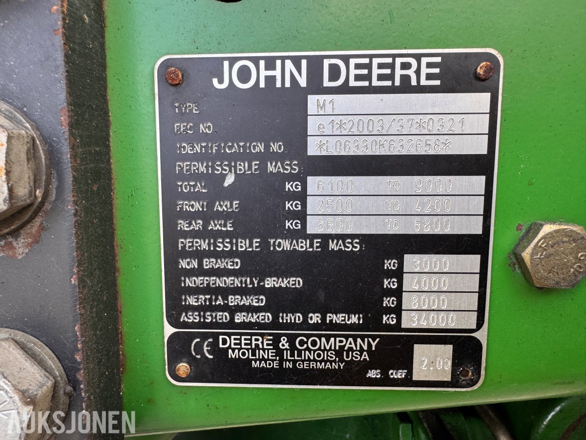 2011 John Deere 6330 Premium med Quicke Q45 laster