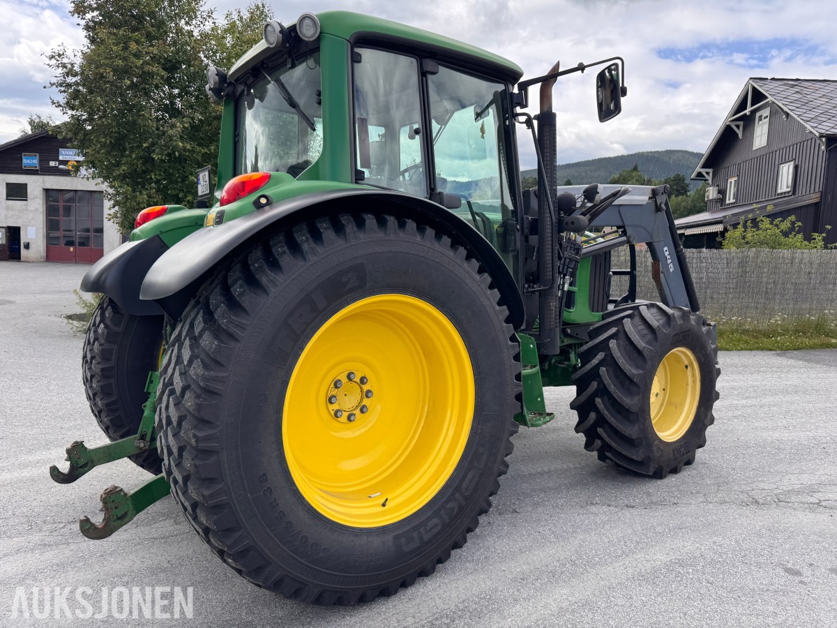 2011 John Deere 6330 Premium med Quicke Q45 laster