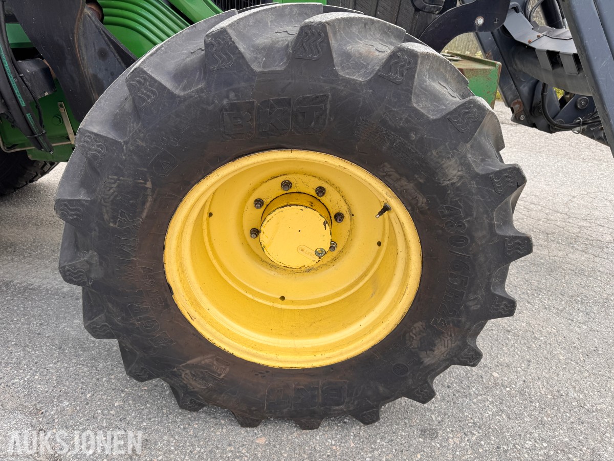 2011 John Deere 6330 Premium med Quicke Q45 laster