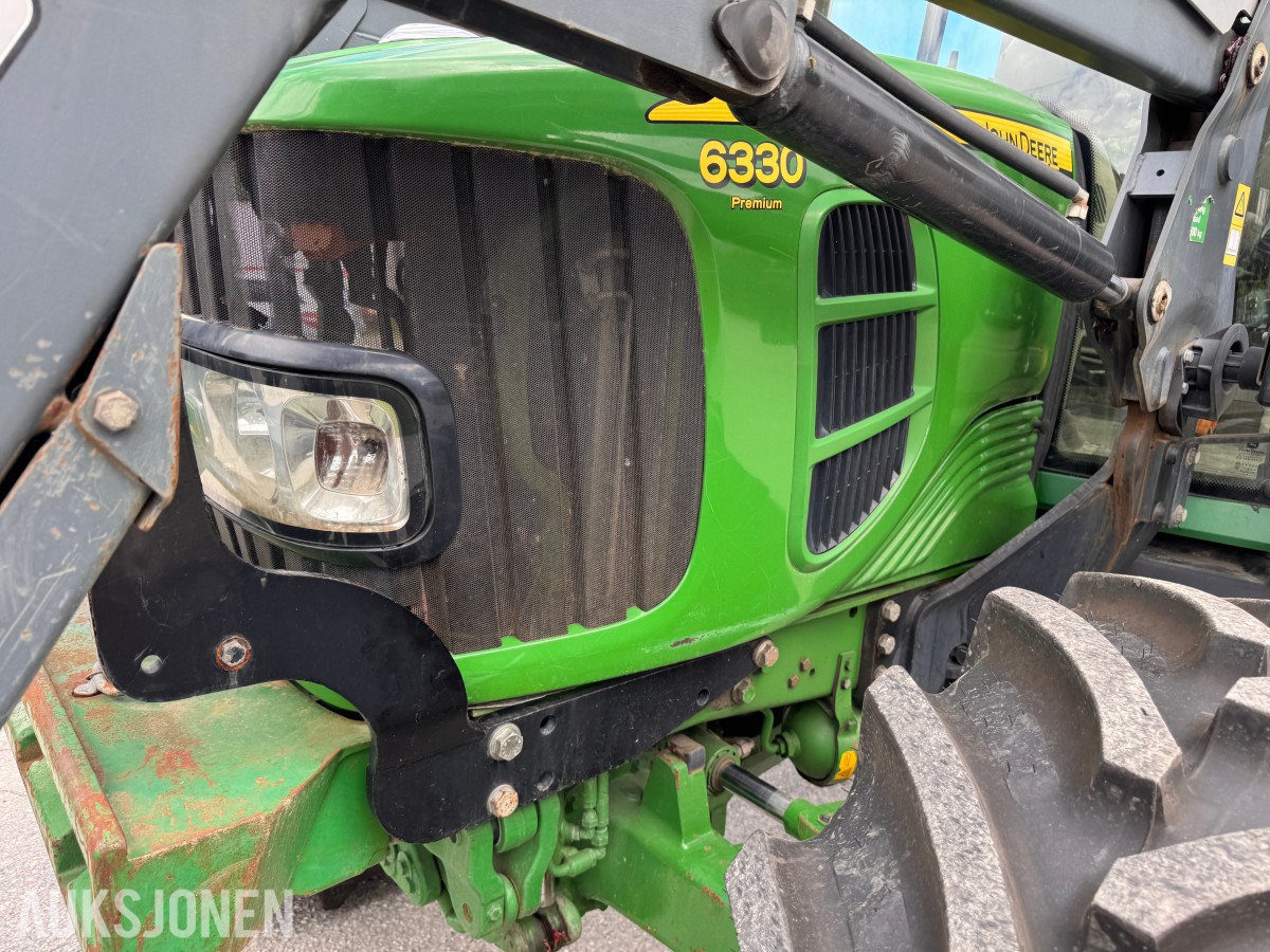 2011 John Deere 6330 Premium med Quicke Q45 laster