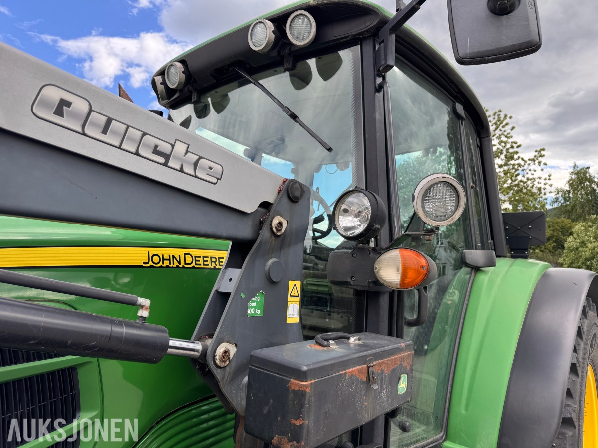 2011 John Deere 6330 Premium med Quicke Q45 laster