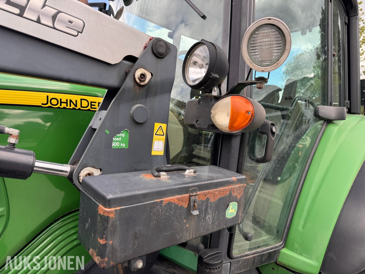 2011 John Deere 6330 Premium med Quicke Q45 laster