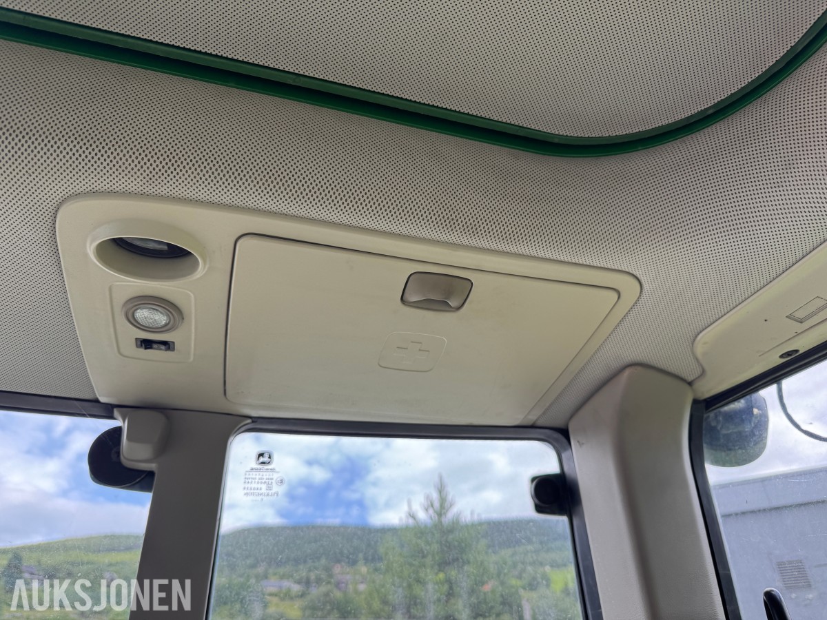 2011 John Deere 6330 Premium med Quicke Q45 laster