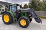 2011 John Deere 6330 Premium med Quicke Q45 laster