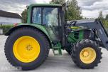 2011 John Deere 6330 Premium med Quicke Q45 laster