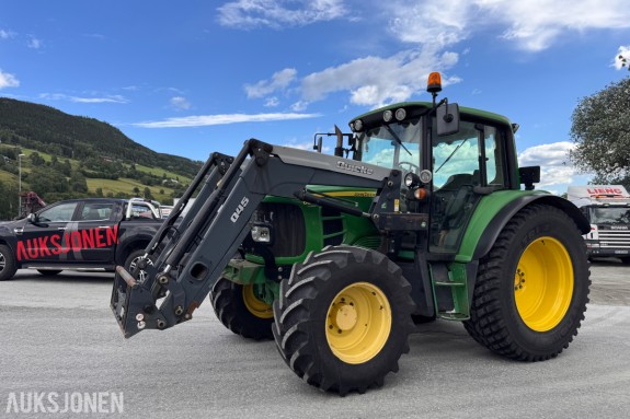 2011 John Deere 6330 Premium med Quicke Q45 laster