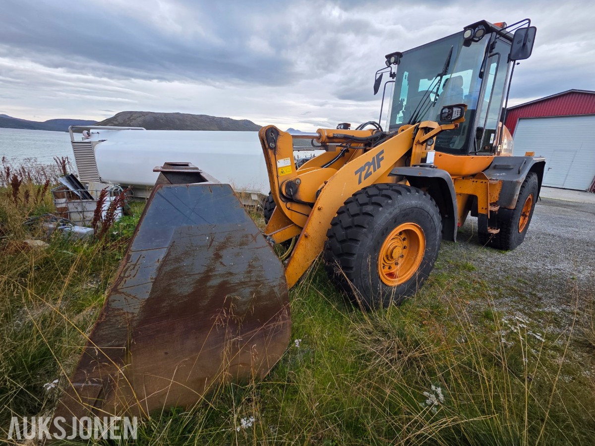 2011 Case 721F Hjullaster med skuff, 9530 timer
