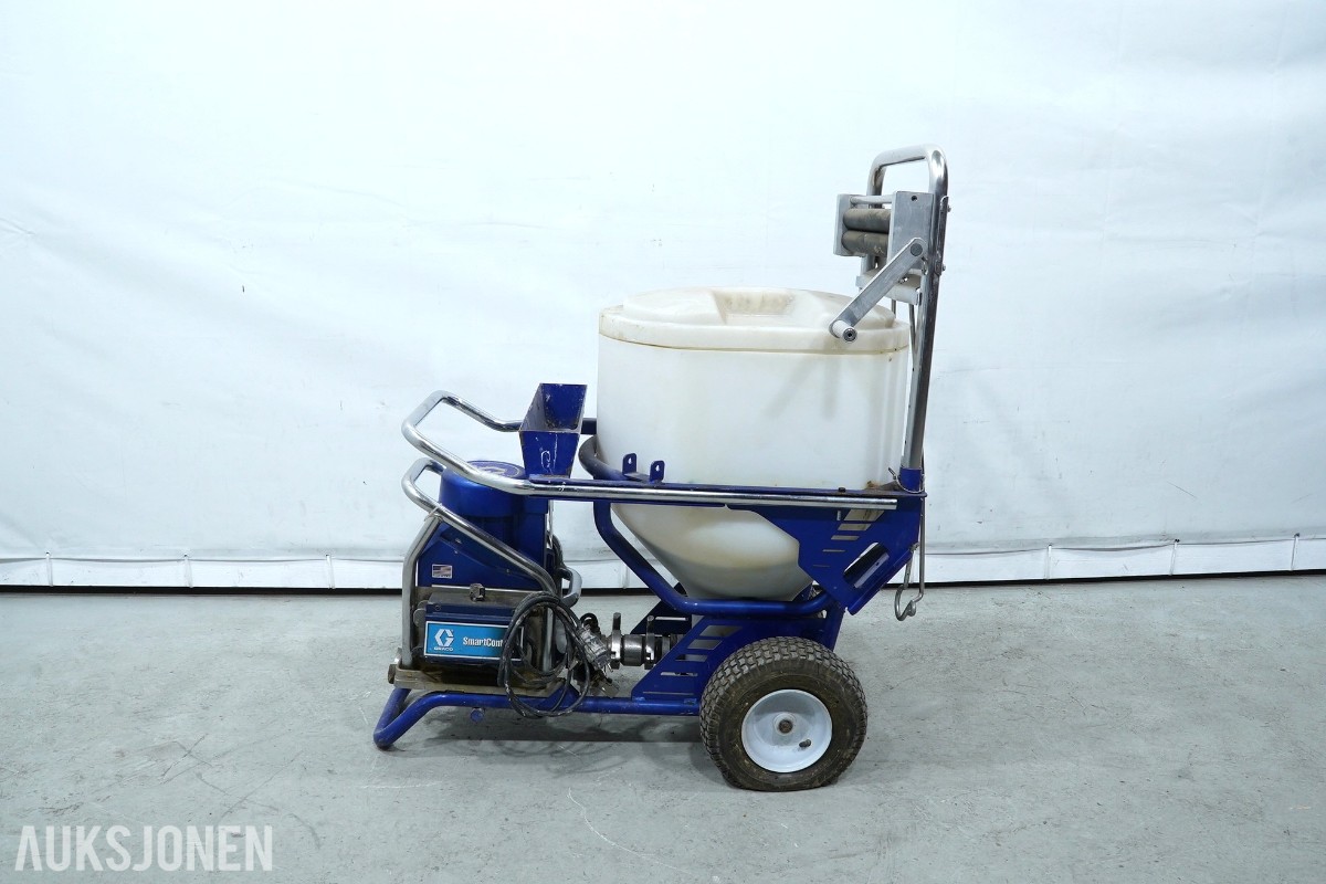 Graco T-MAX 657 sprøyteanlegg med materialbeholder og slanger