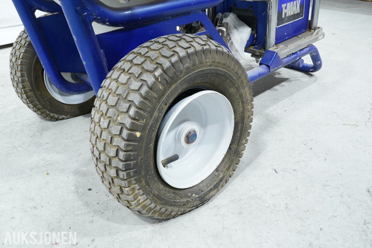 Graco T-MAX 657 sprøyteanlegg med materialbeholder og slanger