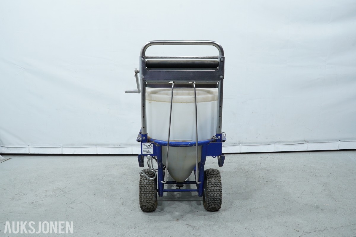 Graco T-MAX 657 sprøyteanlegg med materialbeholder og slanger