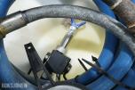Graco T-MAX 657 sprøyteanlegg med materialbeholder og slanger
