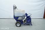 Graco T-MAX 657 sprøyteanlegg med materialbeholder og slanger