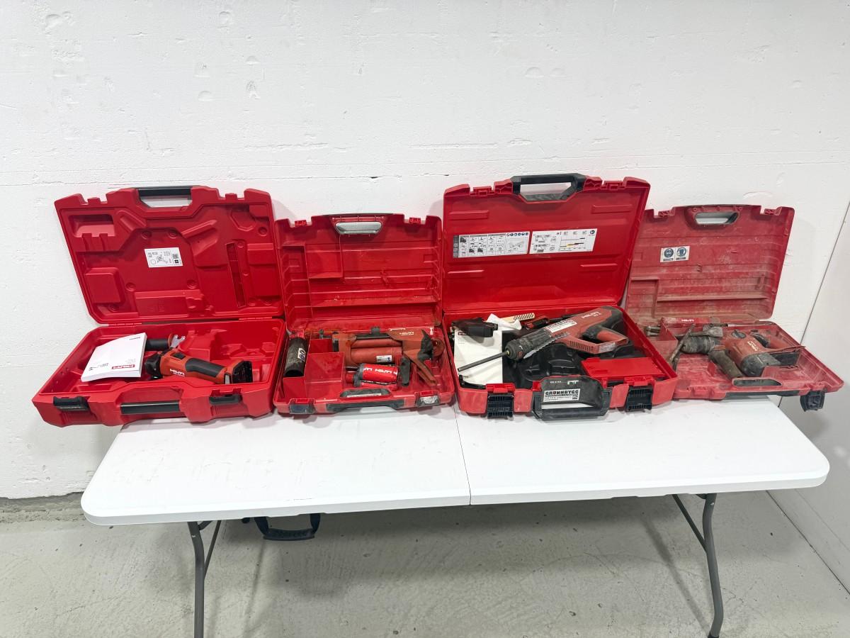 Parti med Hilti vinkelsliper, boltepistol, dispenser og borhammer