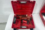 Parti med Hilti vinkelsliper, boltepistol, dispenser og borhammer