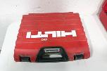 Parti med Hilti vinkelsliper, boltepistol, dispenser og borhammer