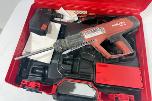 Parti med Hilti vinkelsliper, boltepistol, dispenser og borhammer