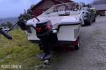 1980 Båt av ukjent merke, med 50hk påhengsmotor og opplagshenger