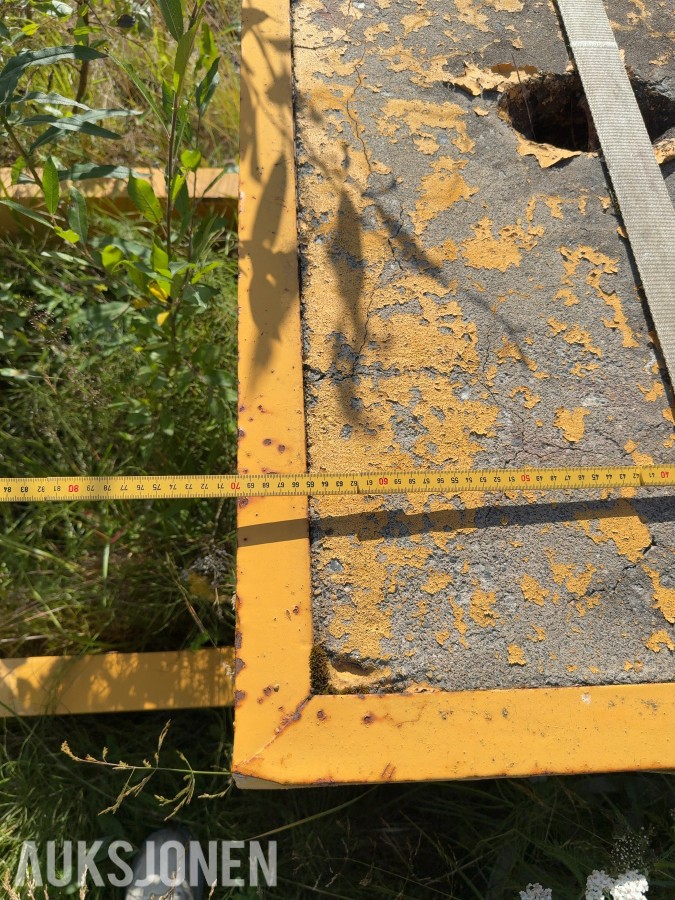 Krokramme med betonglodd