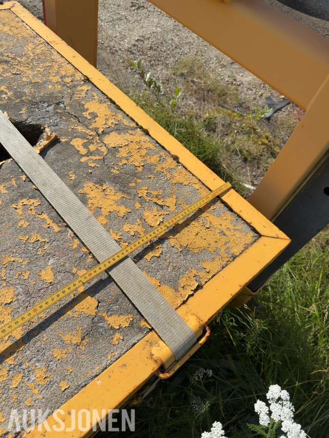 Krokramme med betonglodd