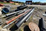 Stor pakke med rør, kummer og diverse materiell