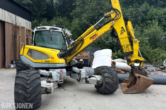 2018 Menzi Muck M540 Mobilgraver - 6 750 timer - 115 kW - Graveskuffe - 12 000 kg