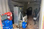 20 fots container med diverse innhold.