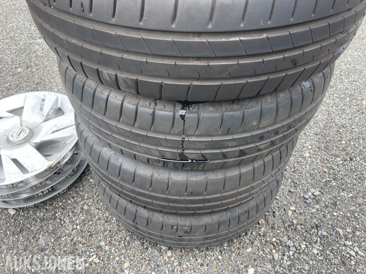 4 stk Falken sommerdekk 195/65 R15 med Nissan hjulkapsler
