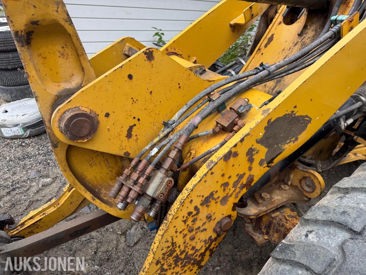2012 CAT 908H hjullaster med ABL-skuff – 5288 timer