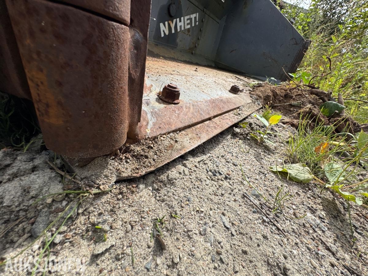 2006 Multiskopan hjullasterskuffe med hydrauliske kantvinger