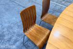 Spisebord med 5 stoler og ileggsplate