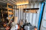 20 fots lagercontainer med hyller og elektrisk opplegg