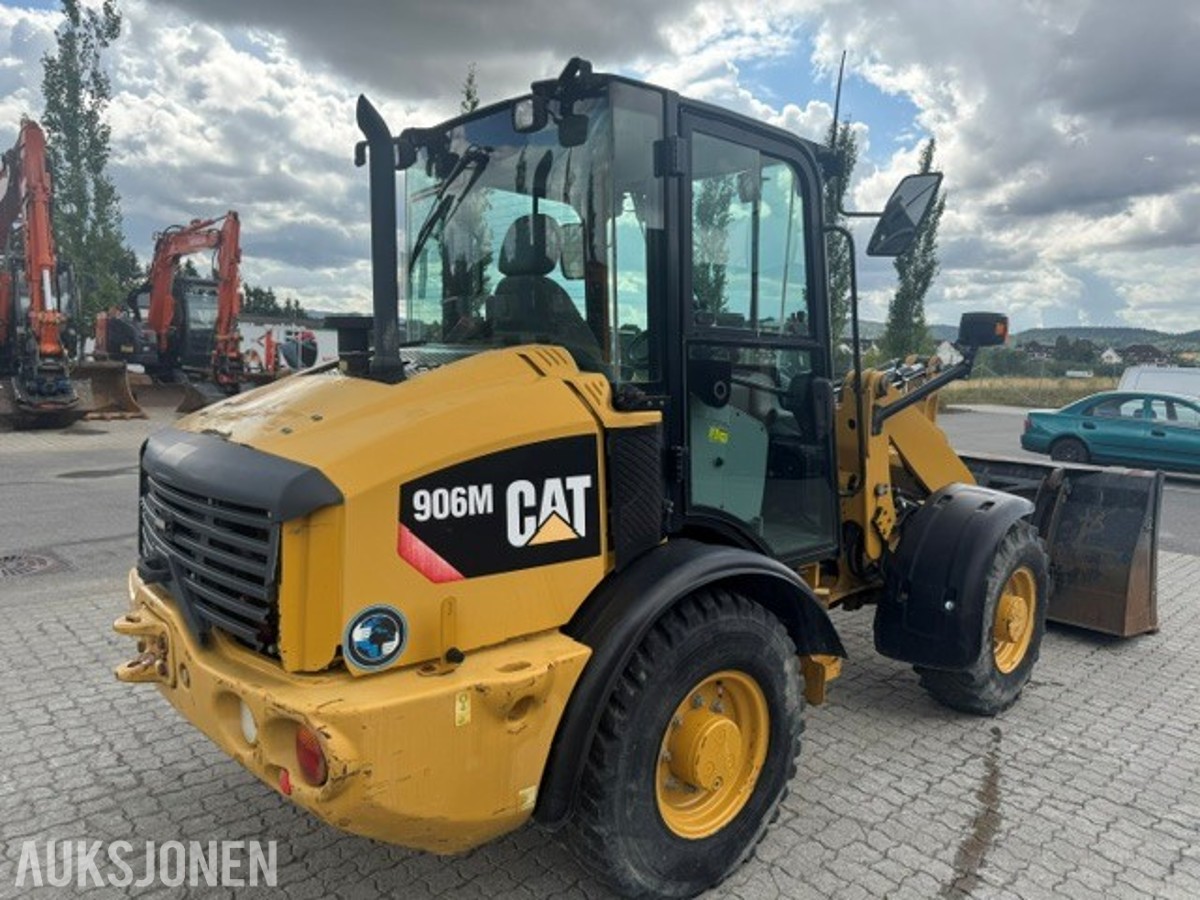 Hjullaster CAT 906M 2015 – HK-feste, ABL-skuffe – 4 531 timer