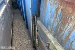 1990 Husmann krokcontainer med komprimator – reparasjonsobjekt