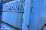 1990 Husmann krokcontainer med komprimator – reparasjonsobjekt